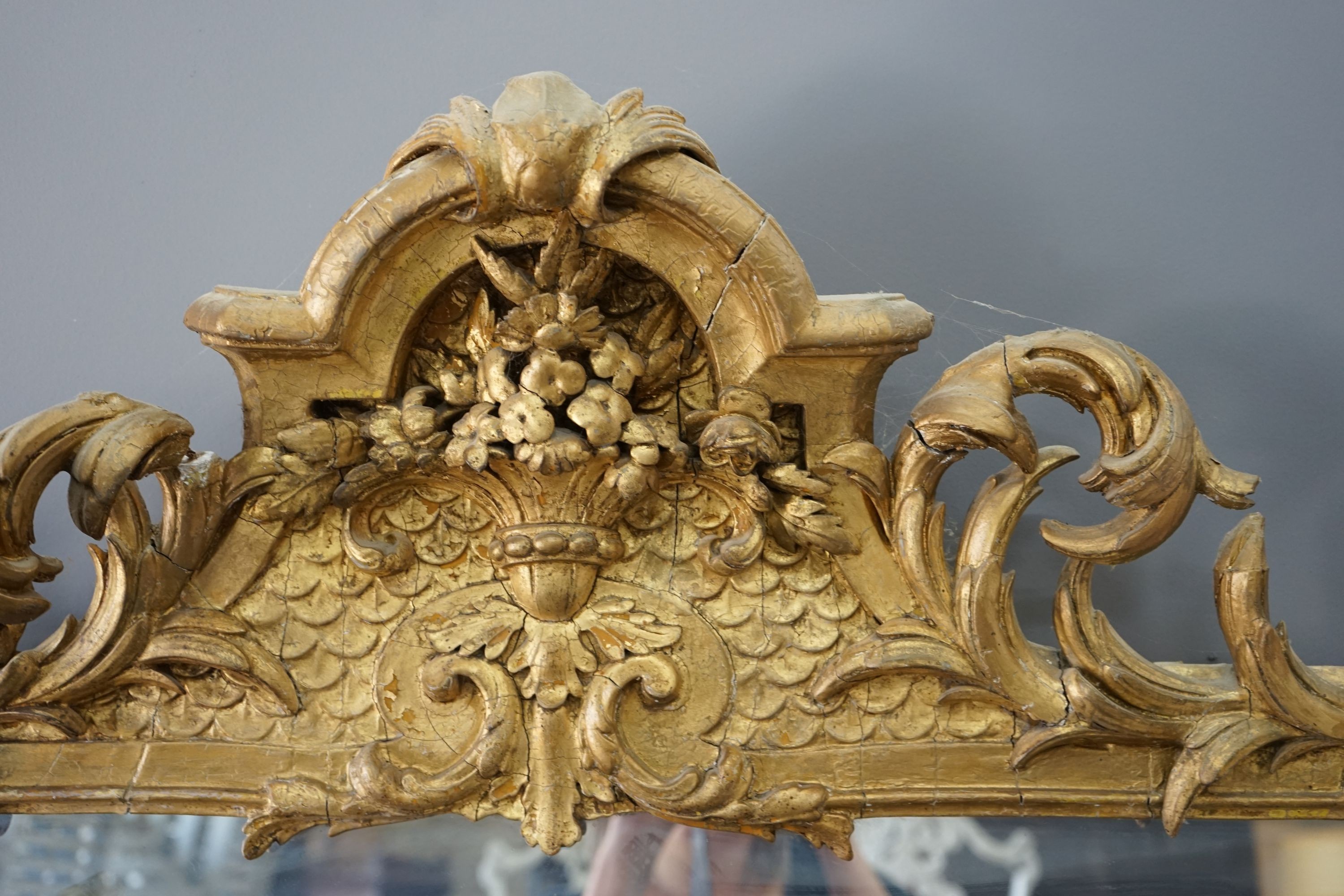 A Victorian giltwood and gesso overmantel mirror, width 130cm, height 168cm